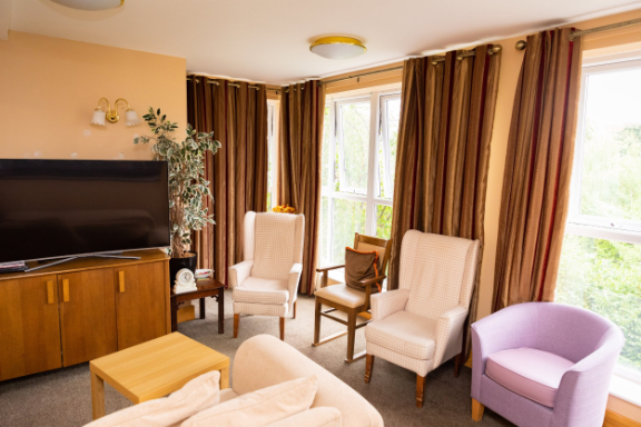 Family room with tv and chairs