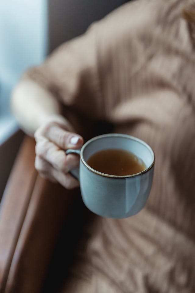 resident with a cup of tea