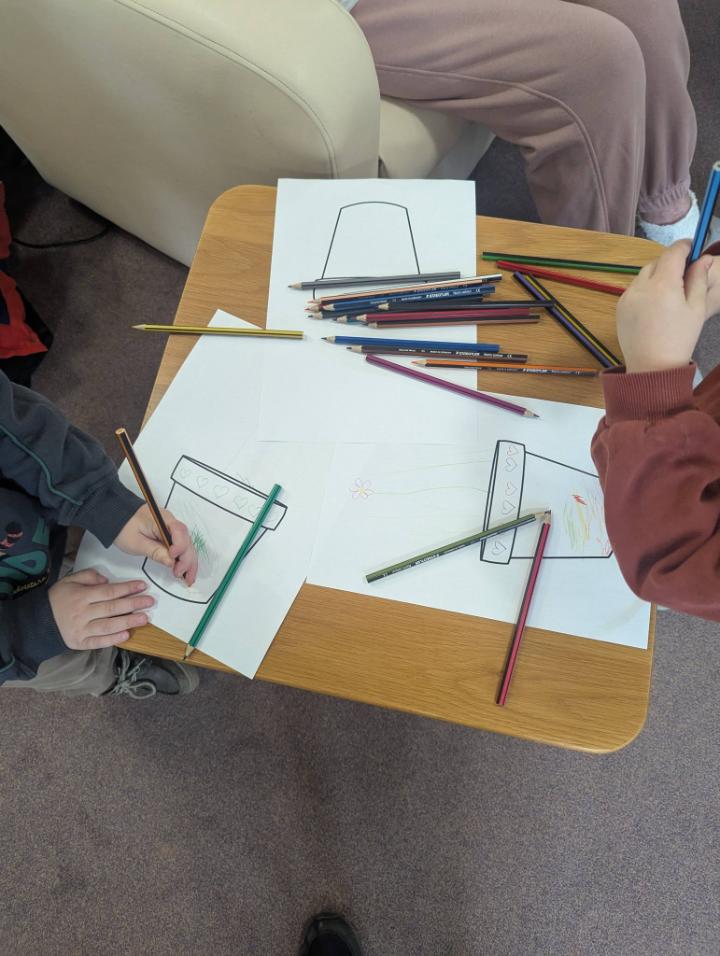 pre school children colouring in