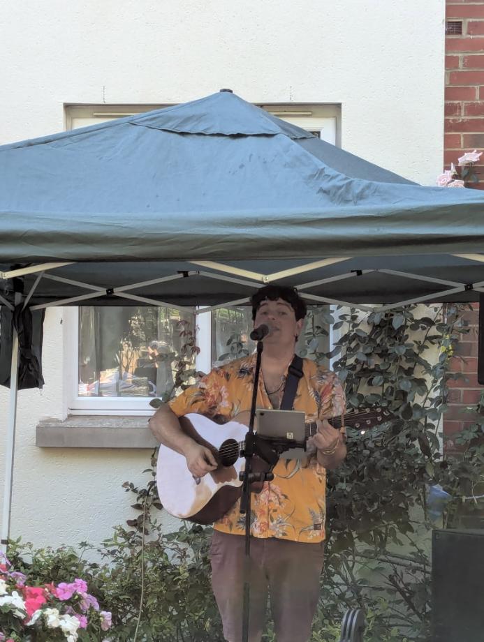 entertainer singing in back garden