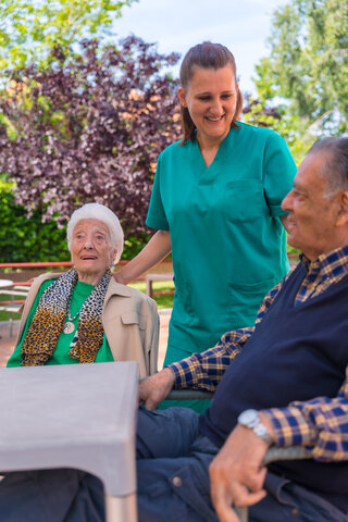nurse and residents outside