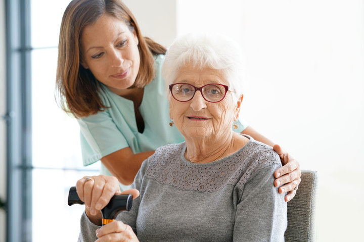 carer helping a resident with daily living