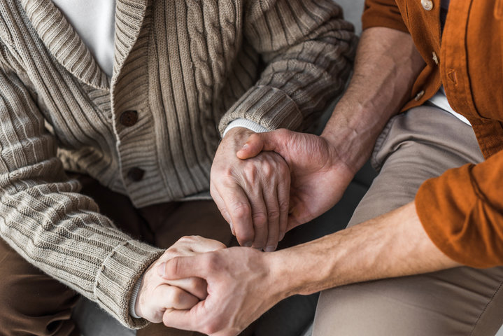 two people holding hands